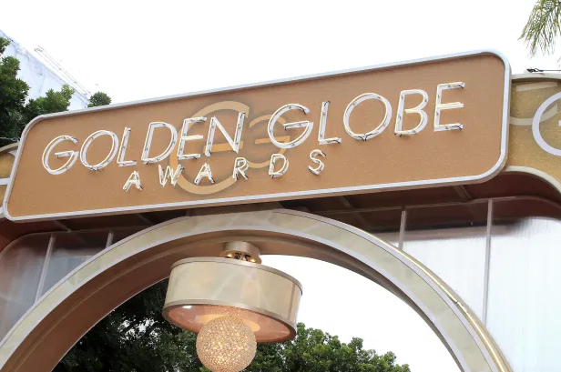 golden globe award to a movie about trial of protest against vietnam war